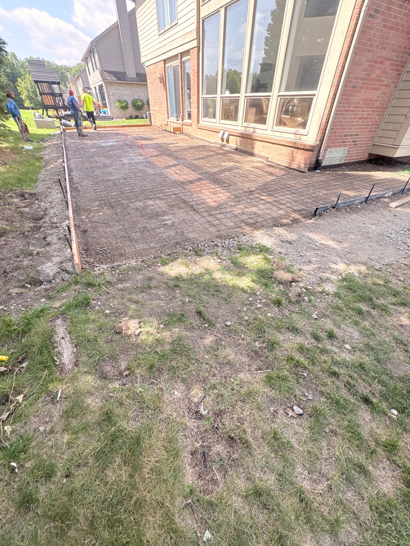Rebar grid installed for a backyard concrete patio