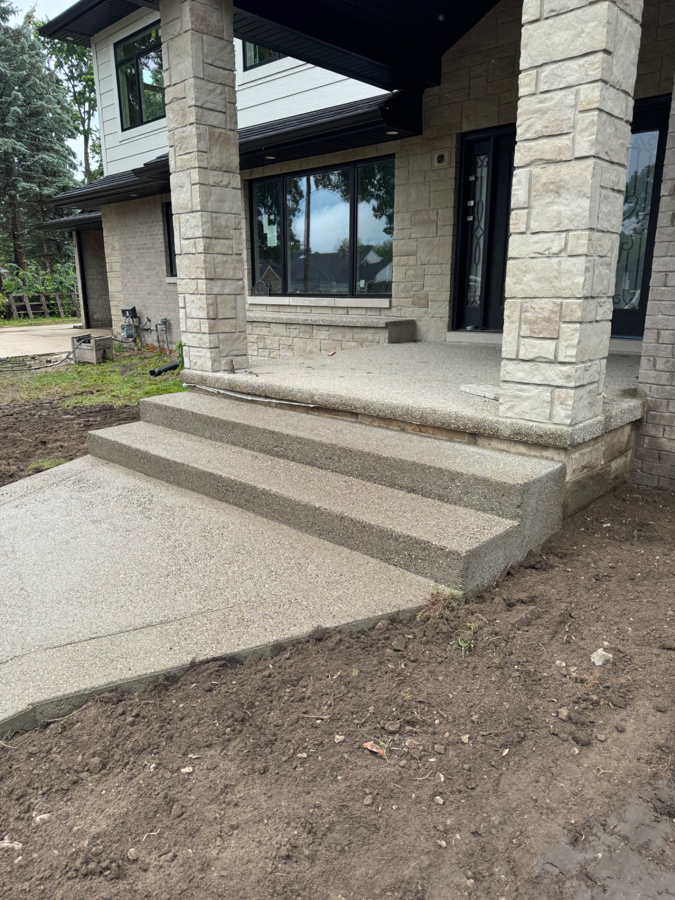 Finished exposed aggregate front steps and porch